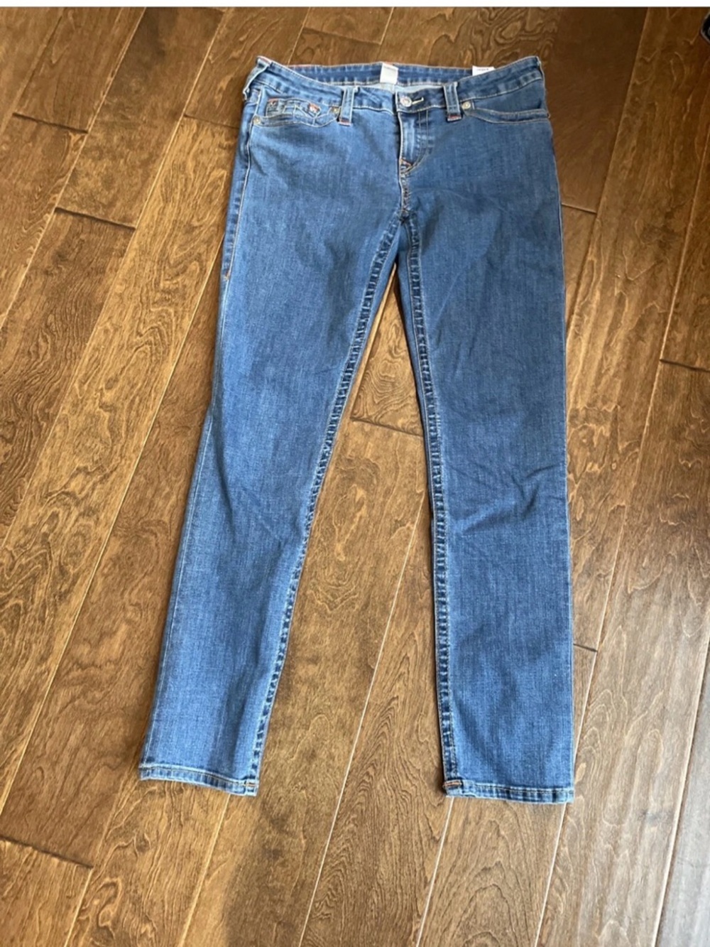 True Religion Women's Skinny Jeans in Classic Blue. Midrise. 33 x 32L